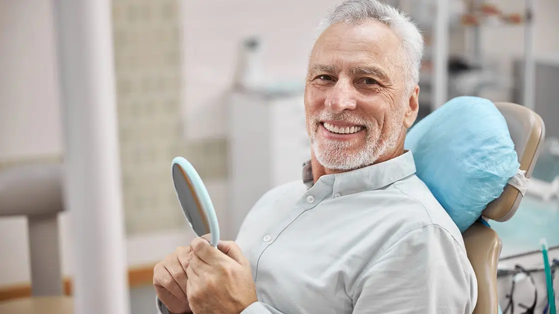 Smilling Man in Dental Chair